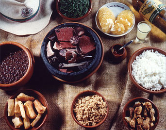 Photoreal photograph of the finished dish Feijoada, the actual plate from Brazil, handmade ceramic, natural window light, shallow depth of field, no text, no logo, no people, Natural window light, ivory linen, handmade ceramic, shallow depth of field, no text, no logo, no watermark, fine-dining magazine photograph. Feijoada